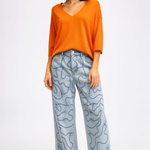 Jean à broderies abstraite